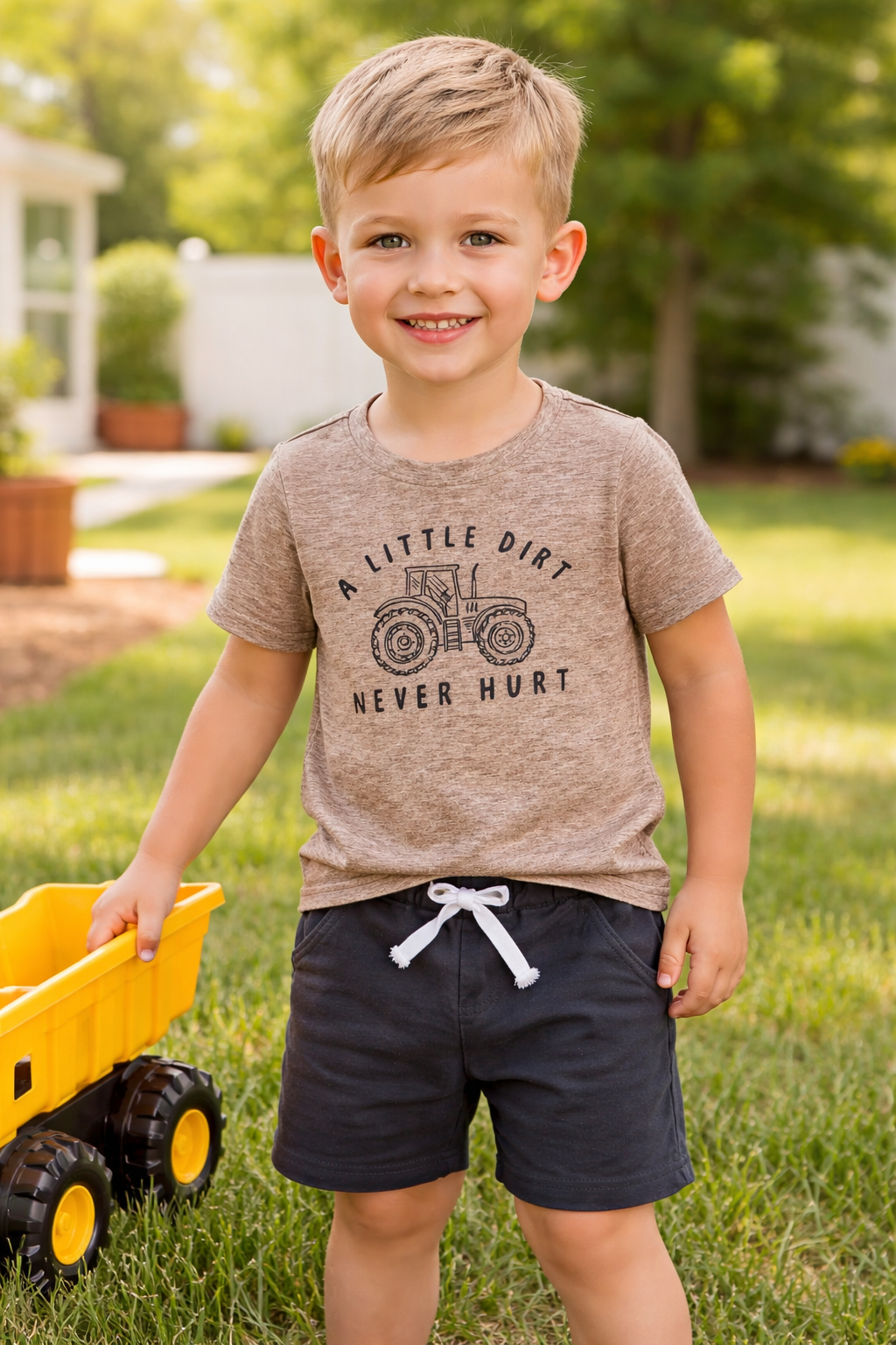 “A little dirt never hurt” tractor outfit.